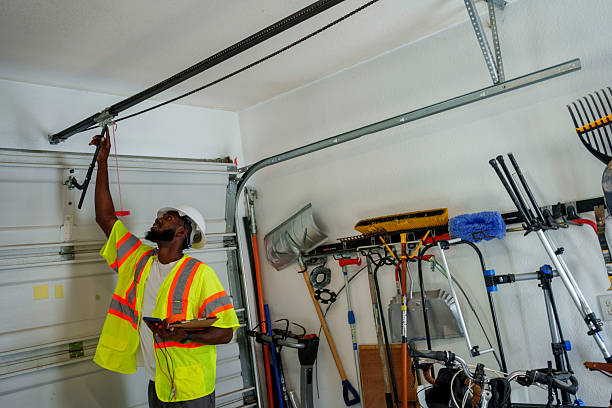 Professional Garage Door Panel Replacement technician working in Monessen, PA